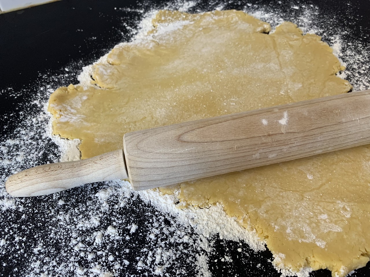 Spread the dough with a rolling pin