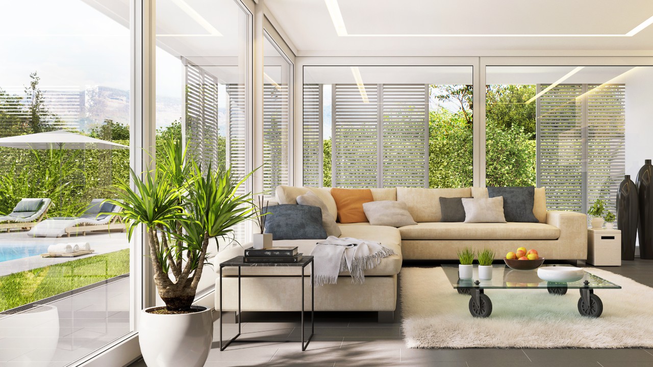 Maison avec salon canapé piscine baie vitré lumière